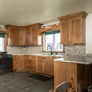New-construction kitchen with custom hardwood cabinetry and granite countertops in Willow Street, PA