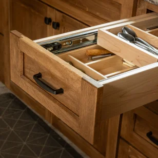 Built-in utensil organizer in kitchen cabinetry