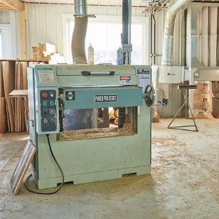 A wood cutting machine in EastSide's wood workshop in Honey Brook, PA